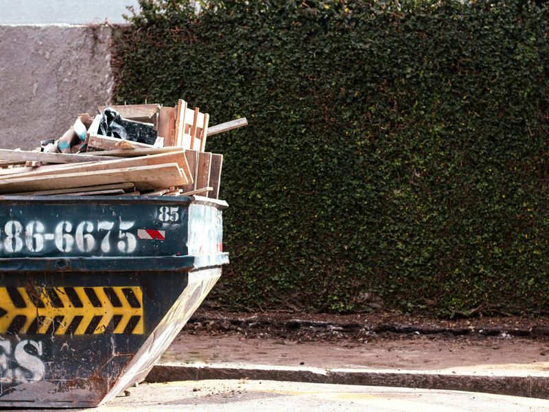 A 4-yard midi skip loaded with timber